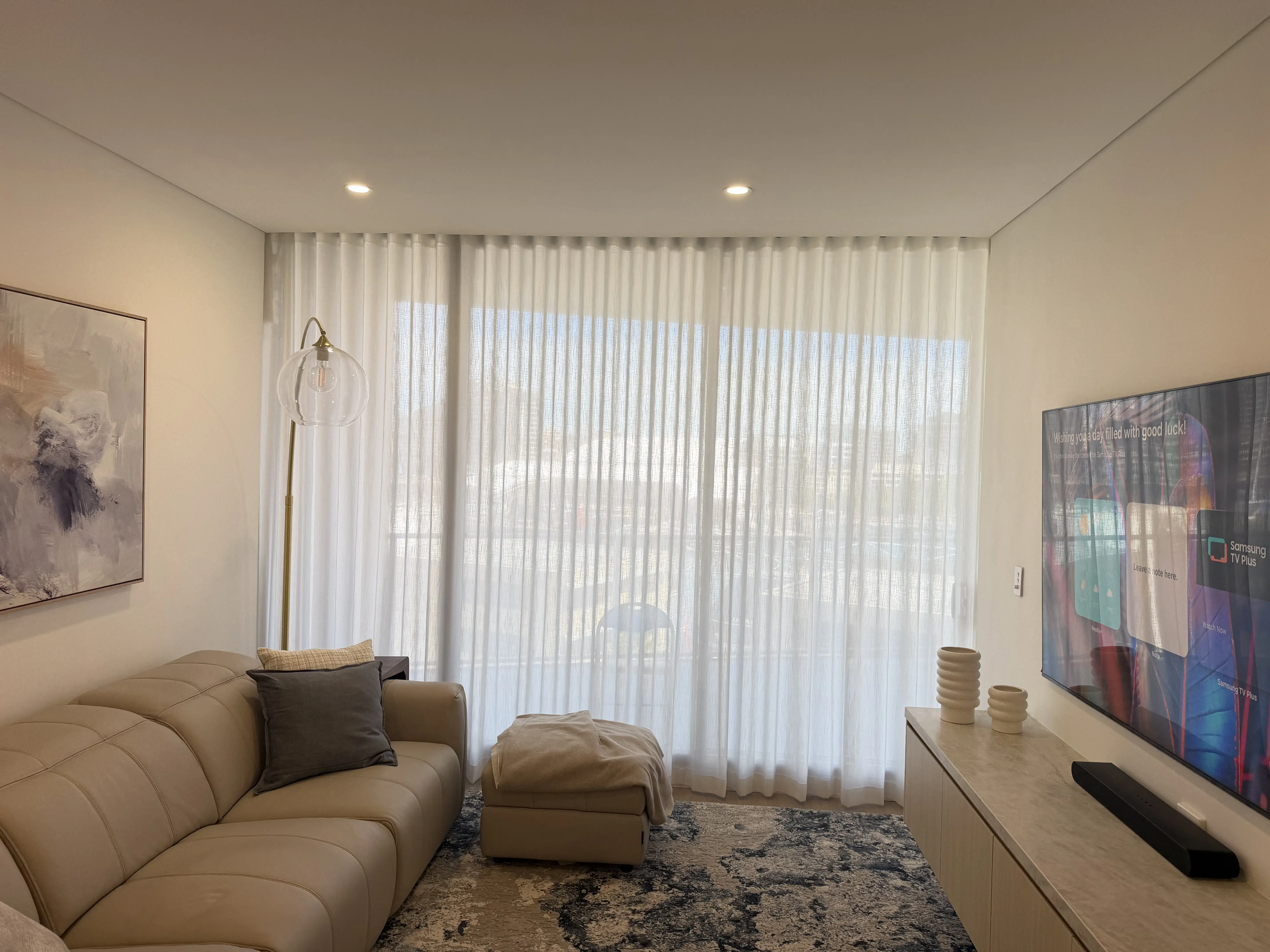 Sheer curtains installed in a Sydney living room