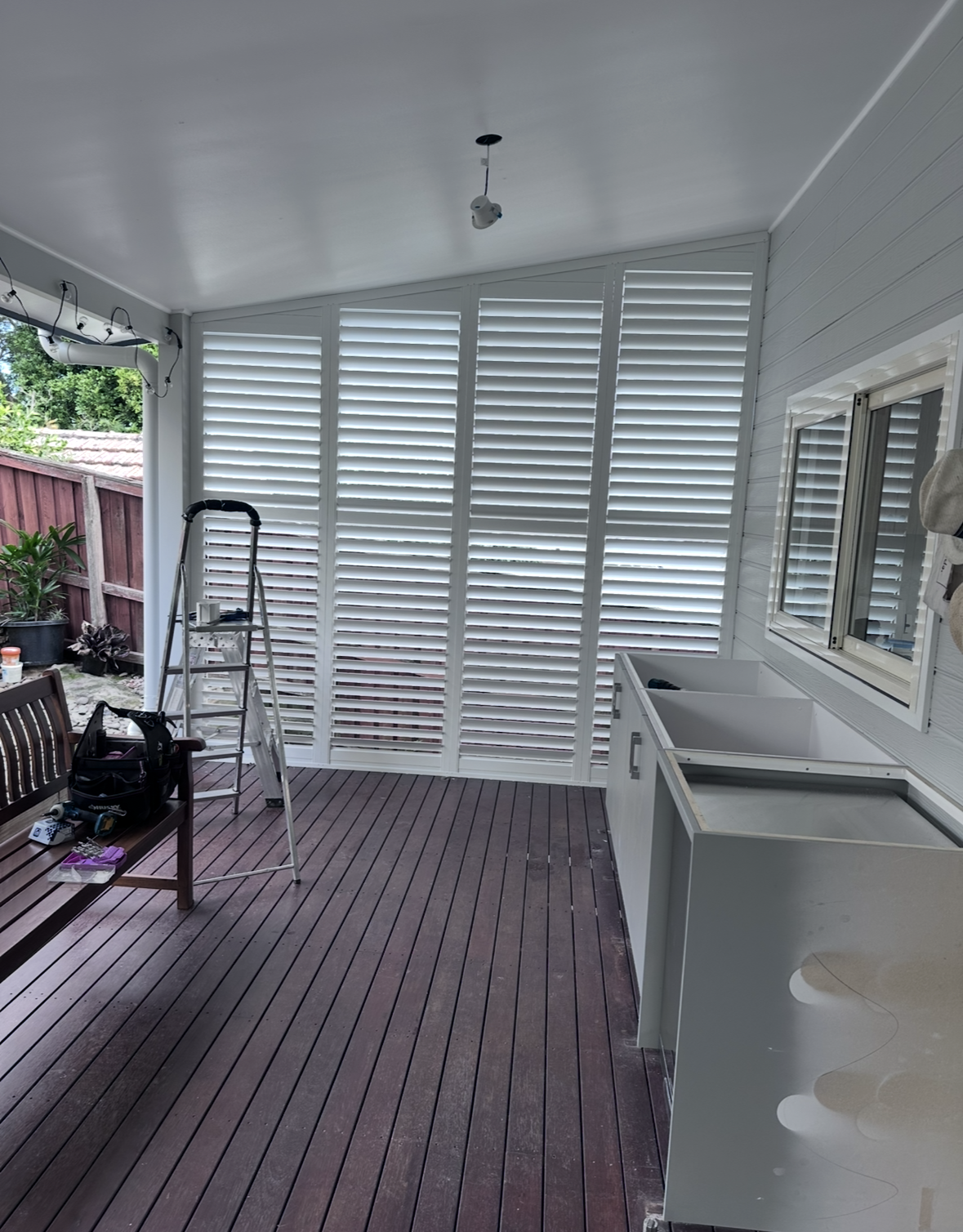 Outdoor patio with retractable awnings