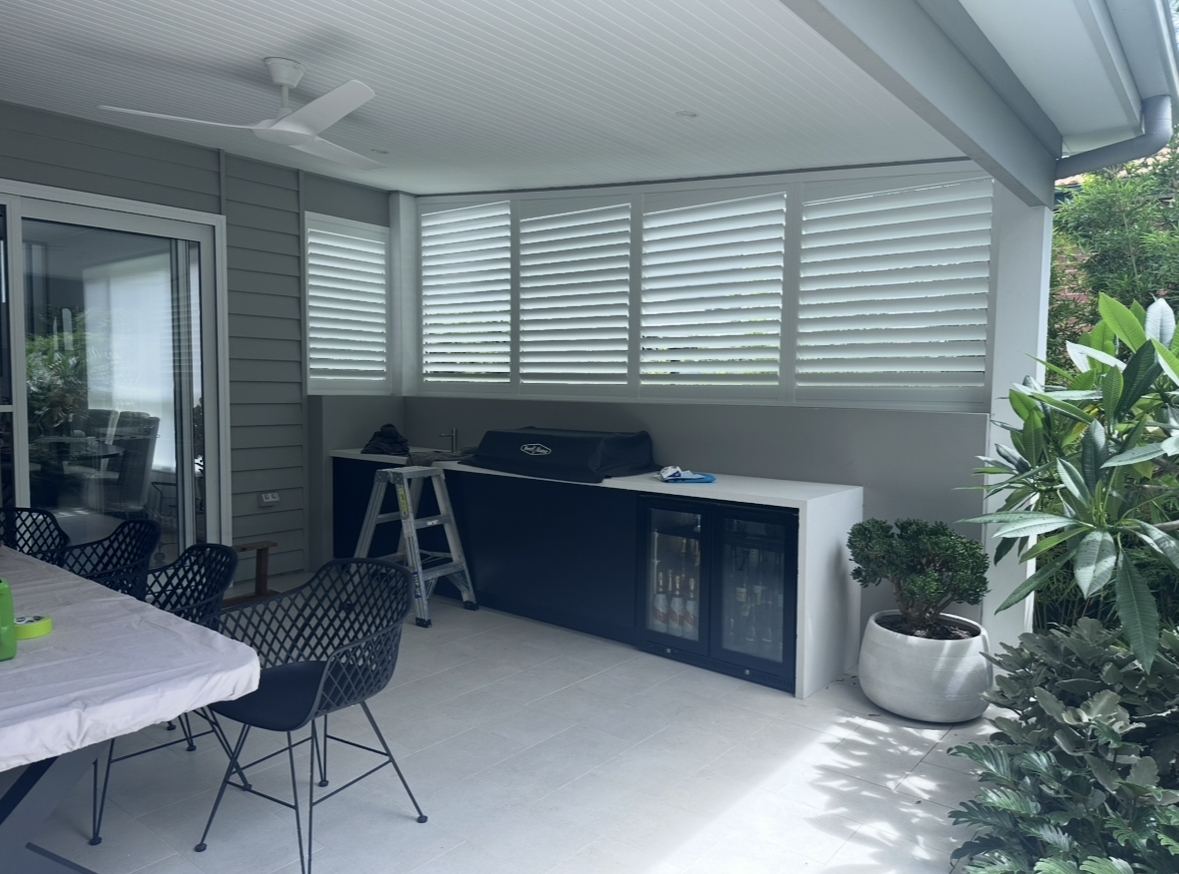Outdoor patio with retractable awnings